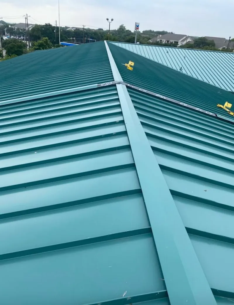 Green commercial metal roof ridge and valley for Metal Roof Repair in Watford City